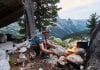 4 Things Every Prepper Should Own Man Built A Campfire In The Woods In Nature. Survive In The Moun