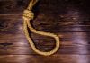 How to Tie a Hangman’s Noose Rope With Noose For Suicide On Wooden Background