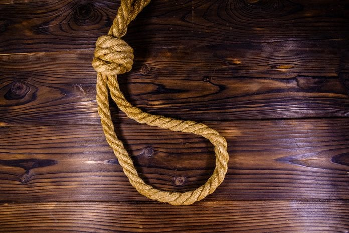 Rope With Noose For Suicide On Wooden Background